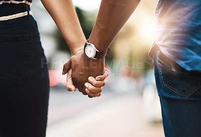 Buy stock photo Love, holding hands and care with couple in city for support, bonding and commitment. Romance, trust and loyalty with closeup of people outdoors on date for partner, marriage and solidarity together