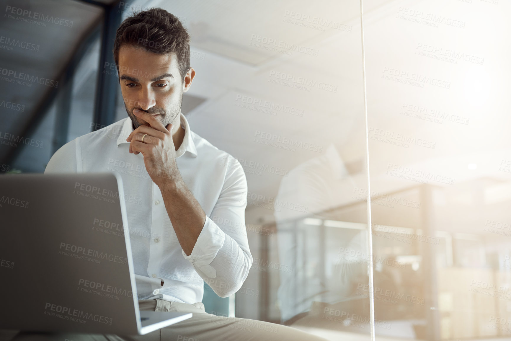 Buy stock photo Laptop, thinking and business man reading email for sales update, feedback or budget report. Serious, computer and planning, problem solving or reflection for solution or idea on glass wall in office