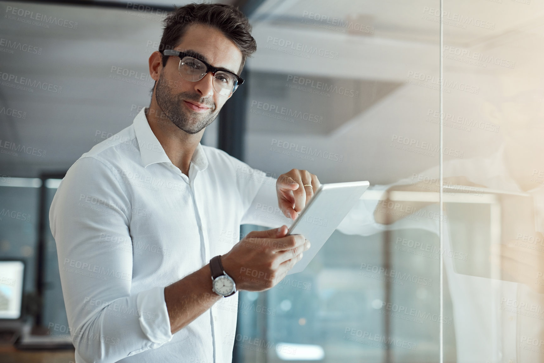 Buy stock photo Man, portrait and tablet at window for business, connectivity and happy for career development. Journalist, technology and glasses in agency for article release, news research and space in Italy