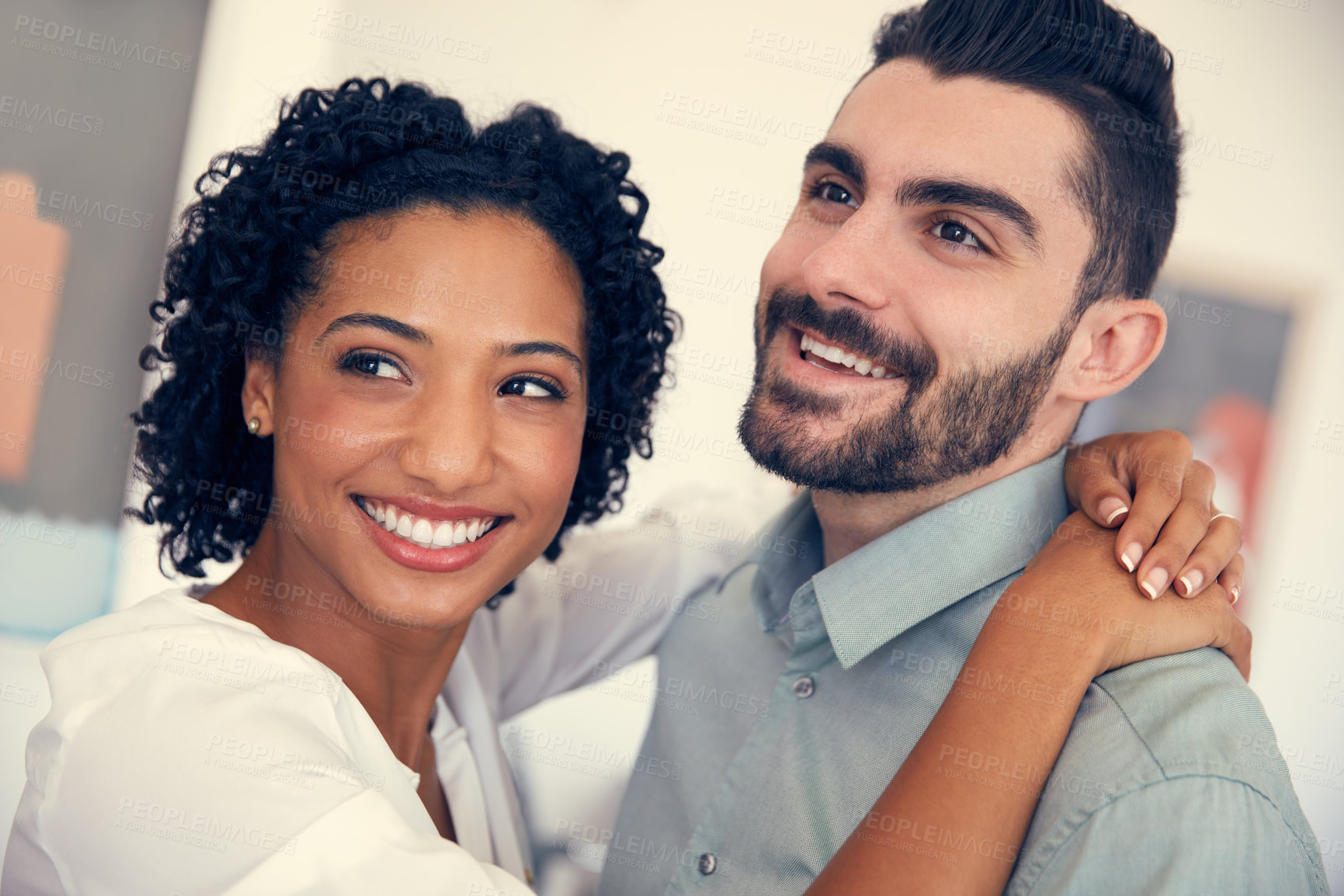 Buy stock photo Cropped shot of a young affectionate couple in the office