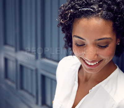 Buy stock photo Cropped shot of a young attractice businesswoman in a corridor at the office
