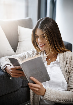 Buy stock photo Reading, relax and girl with book in house for knowledge, learning or self improvement at home. Peace, notebook and woman in living room with novel hobby, literature or information while resting