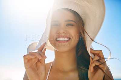 Buy stock photo Sun, face and woman with smile, hat and beach vacation for travel, adventure and happiness outdoor. Freedom, fun and flare with portrait, blue sky and summer coast holiday for nature getaway in Fiji