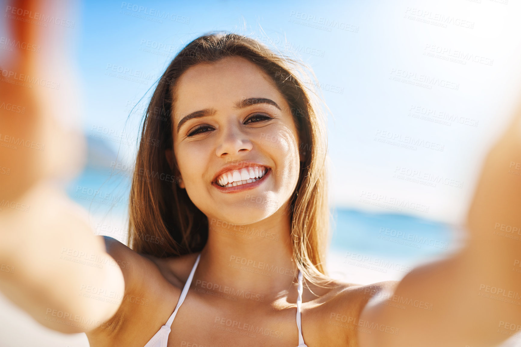 Buy stock photo Closeup shot of a beautiful young woman spending some time at the beach