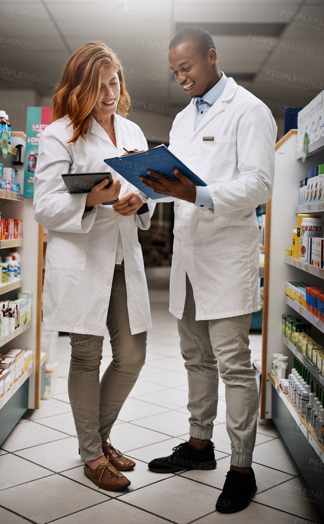 Buy stock photo Pharmacy, man and woman with tablet, clipboard and smile for medical internship, advice and support. Drugs store, teamwork and happy pharmacist with digital app, checklist or online stock inventory