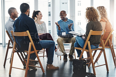 Buy stock photo Business people in an informal meeting, team building discussion or group project planning session. Leader, manager or supervisor talking to diverse colleagues or employees about workflow management