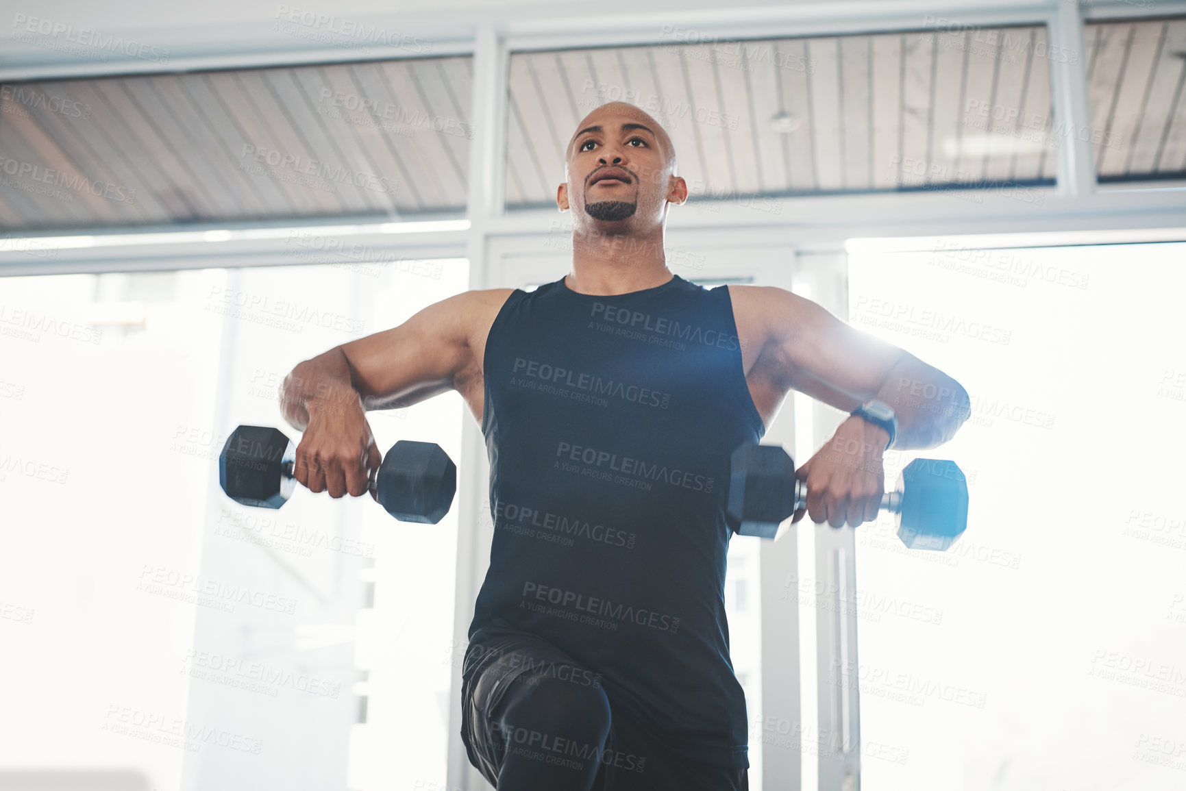 Buy stock photo Fitness, dumbbell and black man in gym for training, workout and wellness for healthy lifestyle. Sports, male person and exercise for muscle strength, resilience and cardio or athlete with commitment