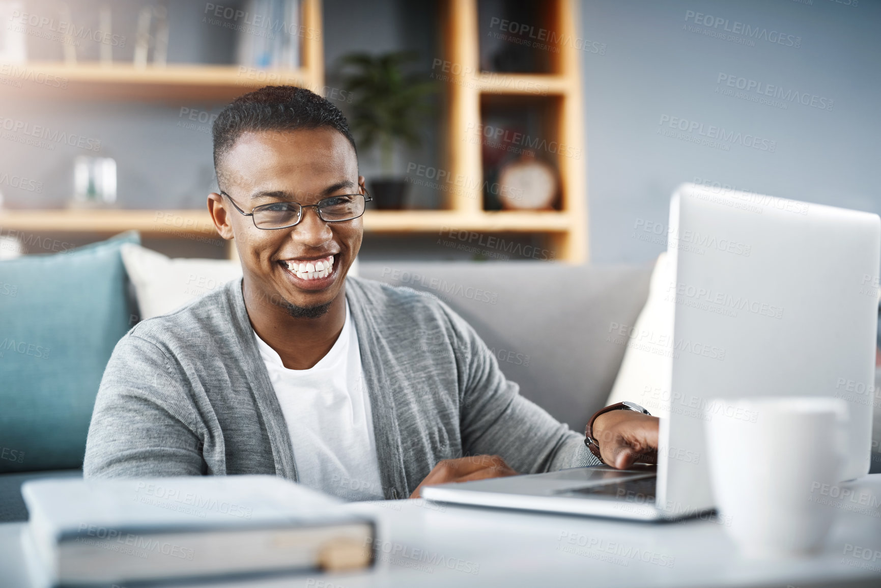 Buy stock photo Laptop, home and portrait of man or student with e learning, university online course or college studying in living room. Happy, excited and young african person on computer for scholarship research