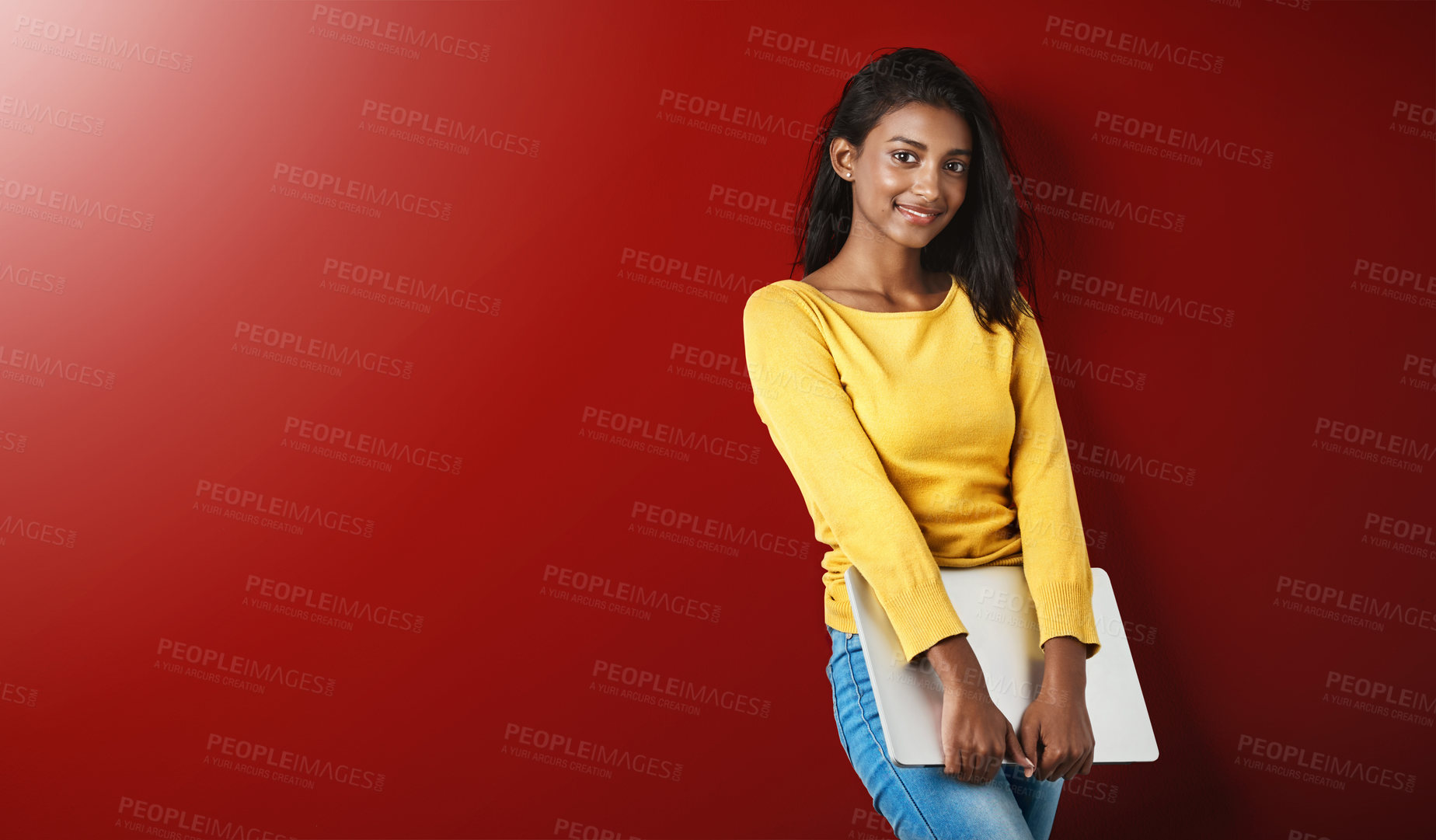 Buy stock photo Happy woman, student and studio portrait with a laptop for university and school work with mockup. Isolated, gray background and education of Indian female person with smile and computer for college