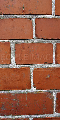 Buy stock photo A close up still life of a wall of red bricks. Hard solid building material with a rough texture on a building in town, city, or house. Concrete surface with cement lining to keep a structure intact