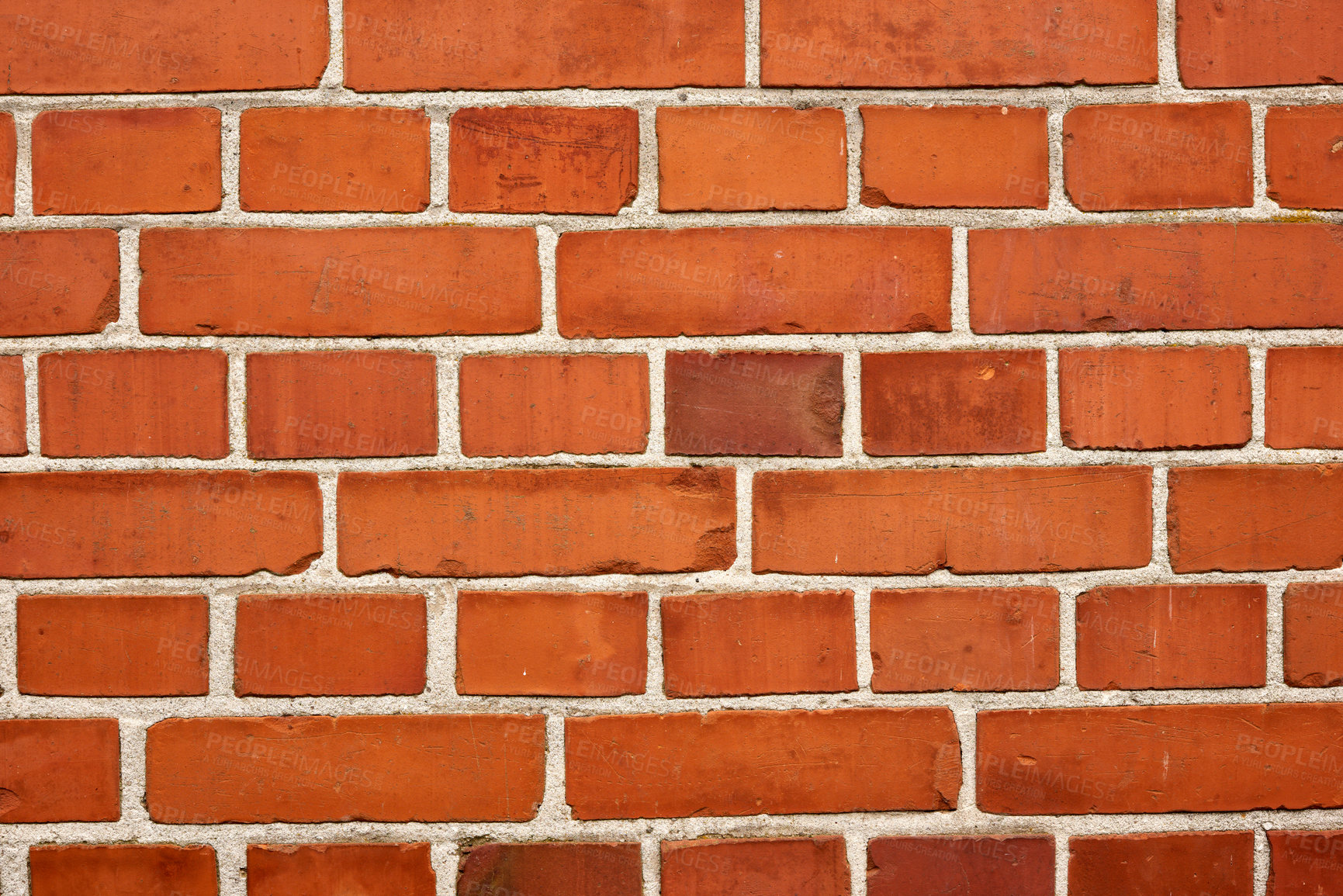 Buy stock photo Closeup of a strong red brick wall and copy space on exterior of a home, house or city building. Texture and detail background of rough architecture construction design of facebrick on old structure