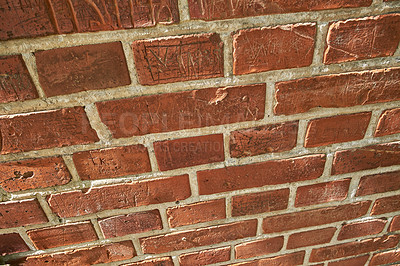 Buy stock photo Closeup of weathered red brick wall and copy space on exterior of a home, house or city building. Texture, detail background, perspective of rough architecture or construction design on old structure
