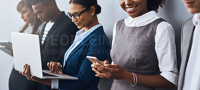 Buy stock photo Recruitment, waiting room and row of people with onboarding, application and phone or laptop. Hiring, diversity or candidate group with technology, work opportunity and banner for paperless interview