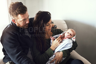 Buy stock photo Calm, relax and parents with baby in home with love, care and newborn child for family. Peace, rest and infant kid on sofa with mother and father in living room for bonding and connection at house.