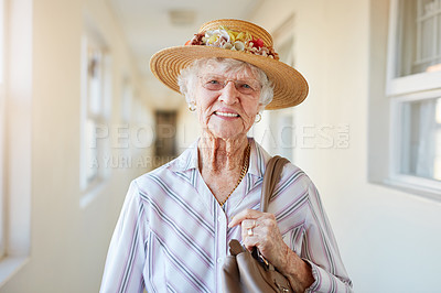 Buy stock photo Portrait of a happy elderly woman getting ready to go out