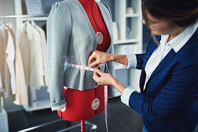 Buy stock photo Tailor, fashion and measuring tape on mannequin in boutique workshop with creative seamstress. Luxury, designer and woman fitting fabric for clothes in retail, small business or sewing in warehouse 