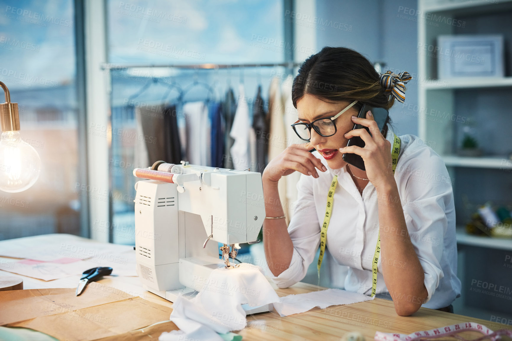 Buy stock photo Seamstress, call or vision of fashion design, business or confused at question, query or feedback. Woman, glasses or smartphone in crm, conversation or planning of new custom designs in office
