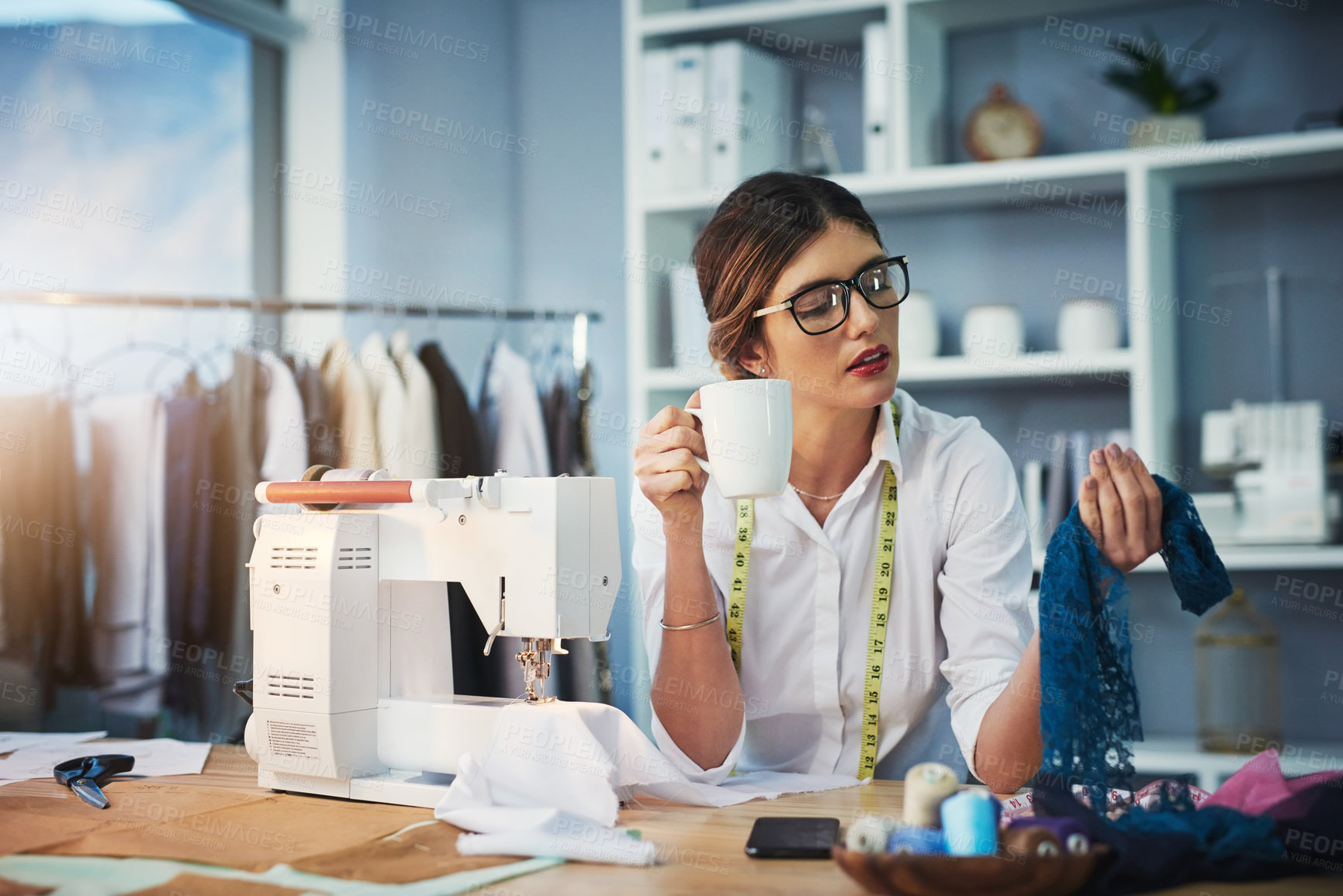 Buy stock photo Woman, coffee or fabric in fashion design, inspiration or question of creative, business or idea. Female tailor, tape measure or cloth in vision, thinking or planning of custom style at workshop desk