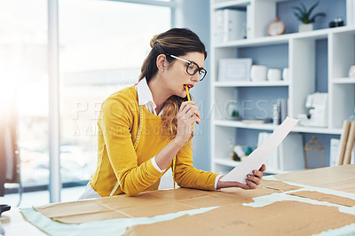 Buy stock photo Woman, fashion and design thinking in studio with pattern for clothes manufacturing, brainstorming or creativity. Female person, thoughts and workshop for style collection planning, textile or fabric
