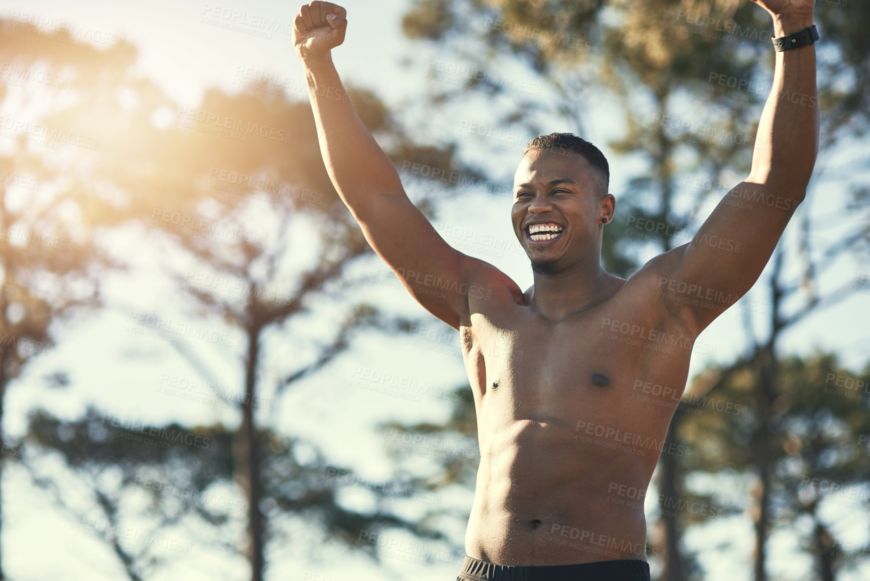 Buy stock photo Victory, sports and forest for African man, athlete and nature for workout, training and exercise. Active, energy and person in environment, muscle and wellness for fitness and healthy body outdoor