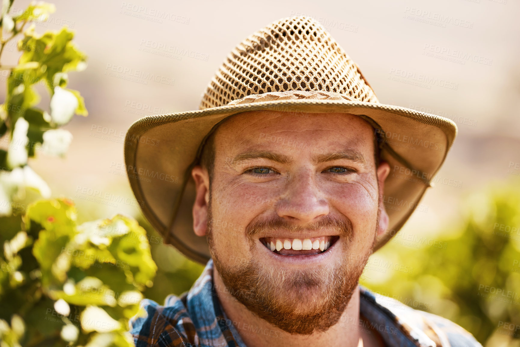 Buy stock photo Happy man, portrait and farmer with hat for natural growth, agriculture or harvest in countryside nature. Face of young male person or gardener with smile for farming, ecology or conservation on land