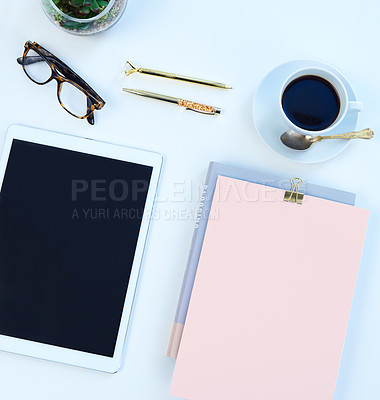 Buy stock photo Above of notebook, tablet and coffee in studio for working, writing notes and planning for career. Creative business, mockup space and diary, smartphone or screen for social media on white background