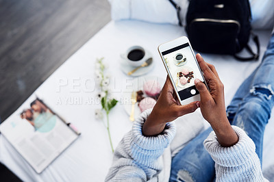 Buy stock photo Black woman hands, social media and photo for food blog with cake on hotel bed. Top, female person and screen of a freelance blogger with dessert, technology and vlog with entrepreneur in room