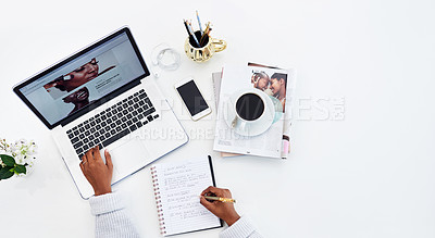 Buy stock photo High angle shot of an unrecognizable woman working at home