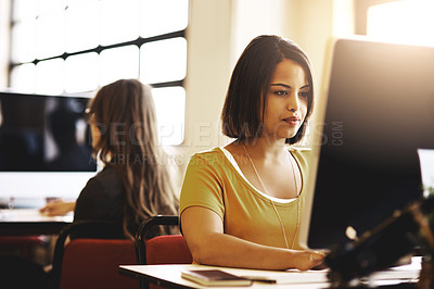 Buy stock photo Cropped shot of a businesswoman working on a computer in an modern office