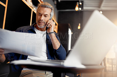Buy stock photo Cropped shot of a handsome mature businessman working in his local internet cafe