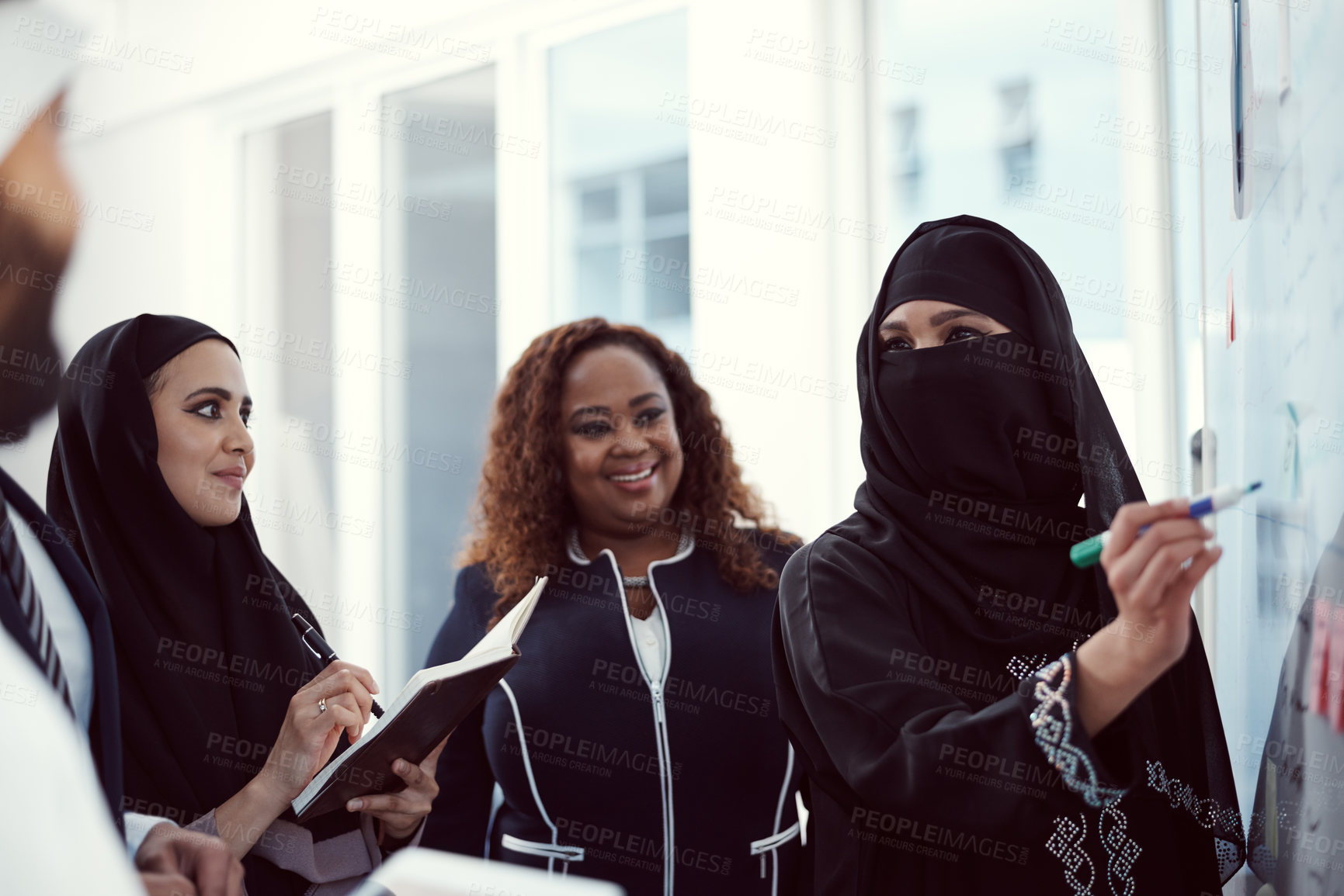 Buy stock photo Mentor, presentation and business muslim woman in office for investor workshop, team and teaching. Stakeholder update, coaching and speaker with employees in conference for training meeting in Qatar