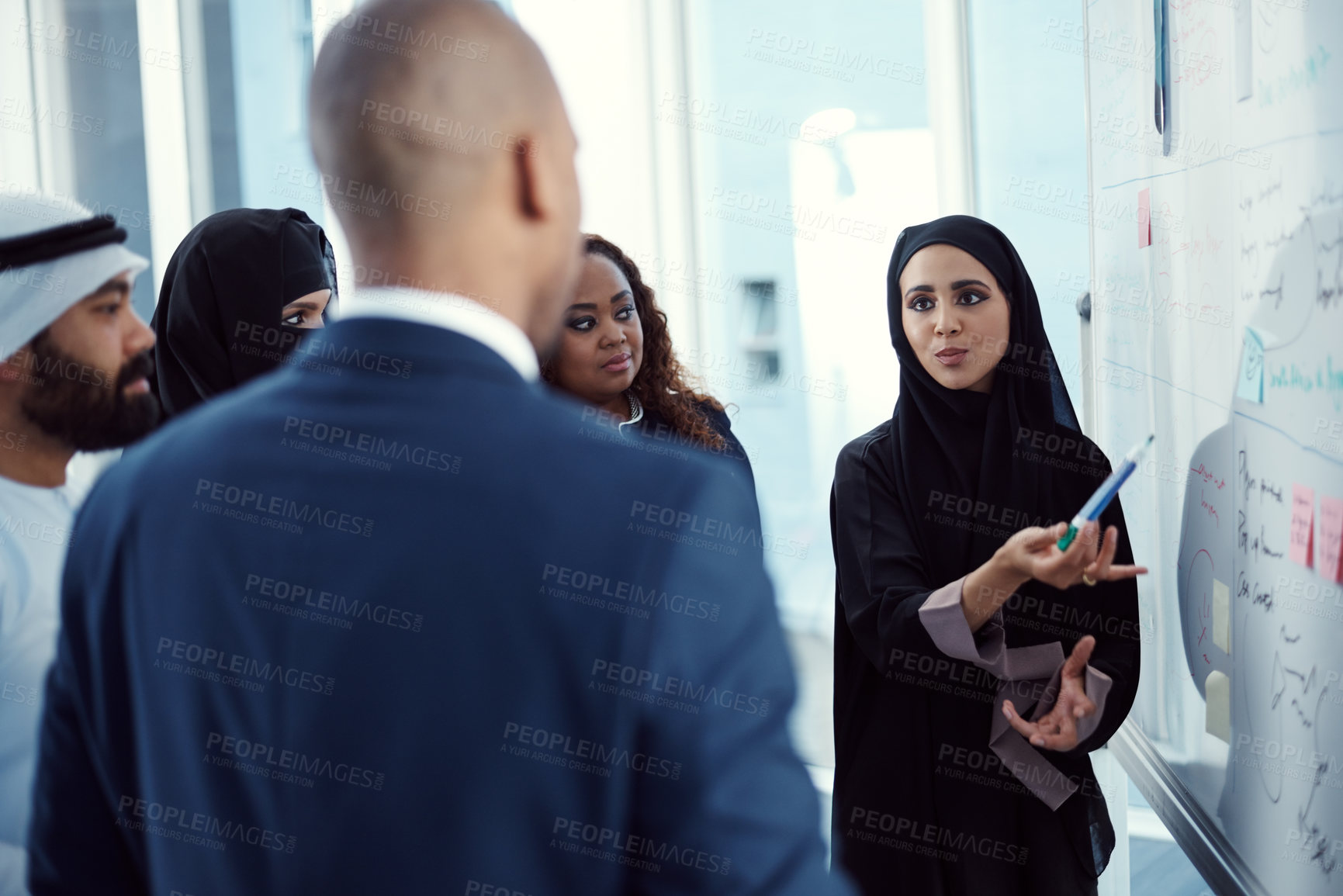 Buy stock photo Workshop, people and group at whiteboard in office for trading presentation, tips and muslim speaker. Coaching, investors and arab coworkers in stock market training for skill development or learning