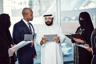 Buy stock photo Tablet, team and discussion with business people in office for trading workshop, planning and b2b advisor. Partner, employees and Middle East representative with online portfolio at expo in Qatar