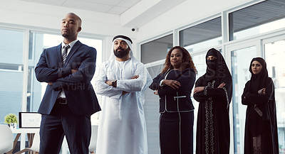 Buy stock photo Low angle shot of a diverse group of business colleagues standing in a single line in their corporate office