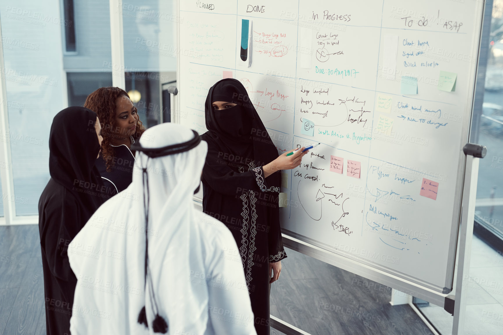 Buy stock photo Training, speaker and business muslim woman in office for investor workshop, team and teaching. Stakeholder update, coaching and presentation with employees in conference for meeting in Qatar