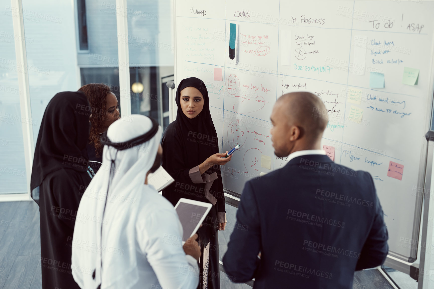 Buy stock photo Training, people or team at whiteboard in office for trading presentation, tips or muslim speaker. Coaching, investors or Arab coworkers in stock market workshop for finance advice, learning or above