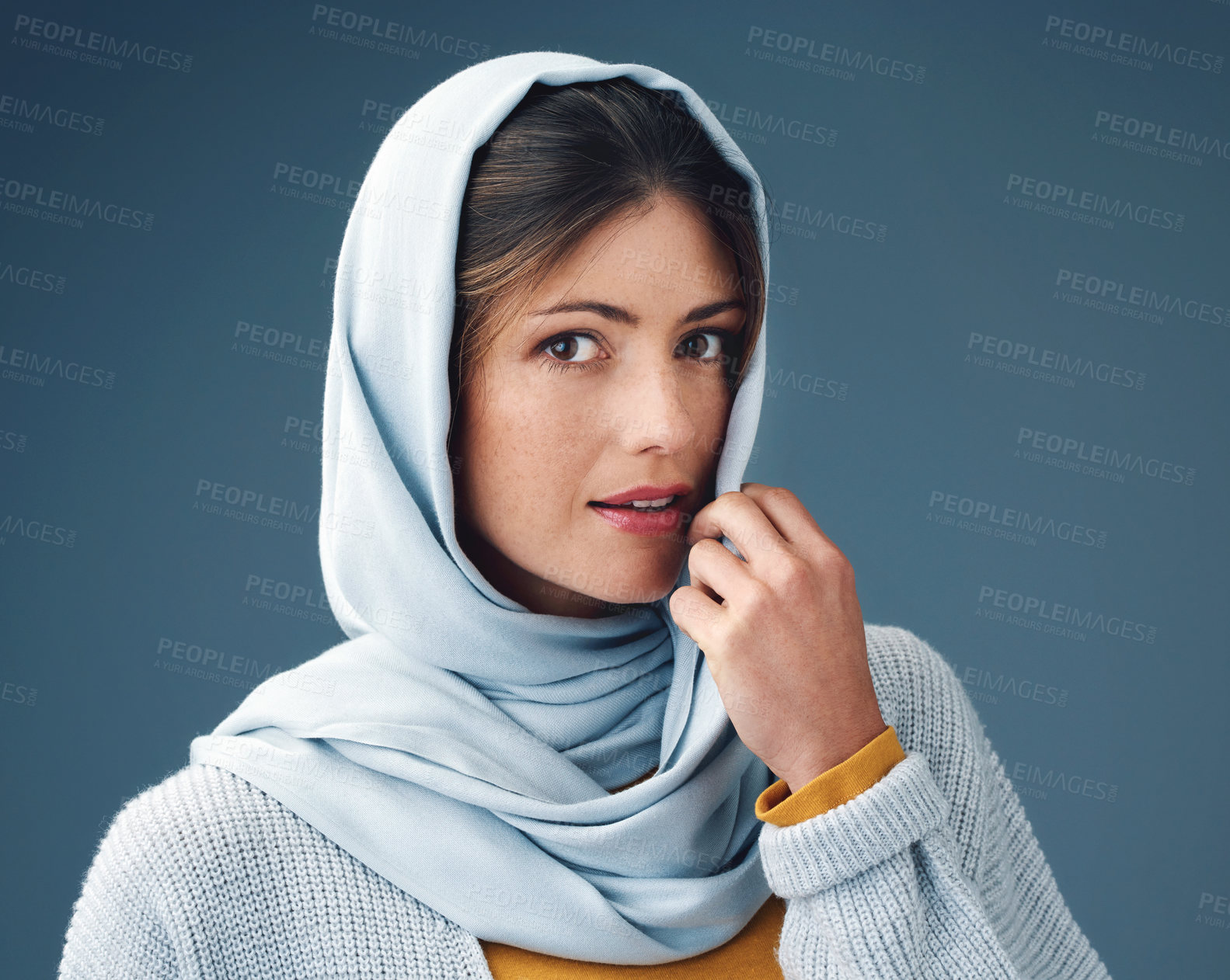 Buy stock photo Woman, smile and studio with hijab in portrait with happy for confidence for islamic culture. Beauty, pride and faith with blue background for arab person with religion, middle east and natural