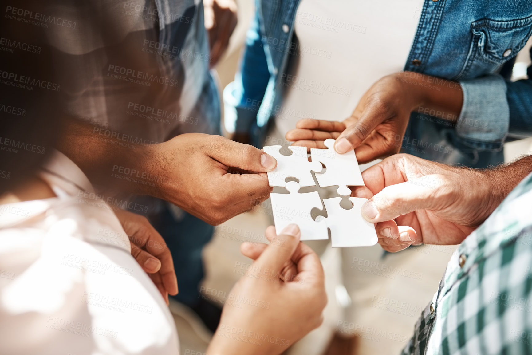 Buy stock photo Hands, team and jigsaw for connection, solution and circle with collaboration for creativity at startup. People, group and scrum with puzzle for problem solving, solidarity or link for synergy at job