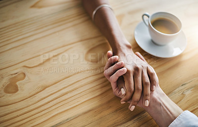 Buy stock photo Closeup shot of two people holding hands in comfort
