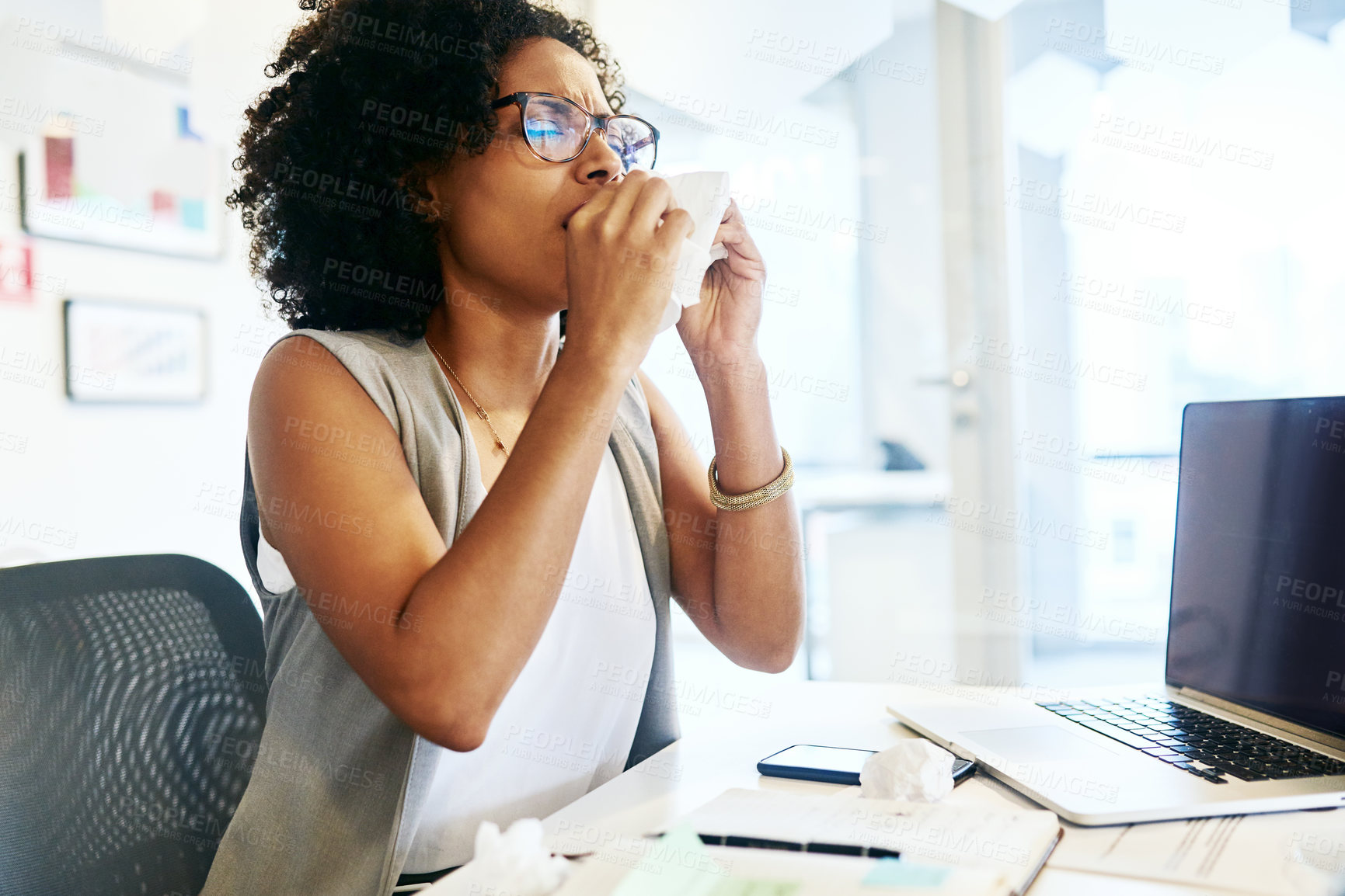 Buy stock photo Shot of a businesswoman working at her desk