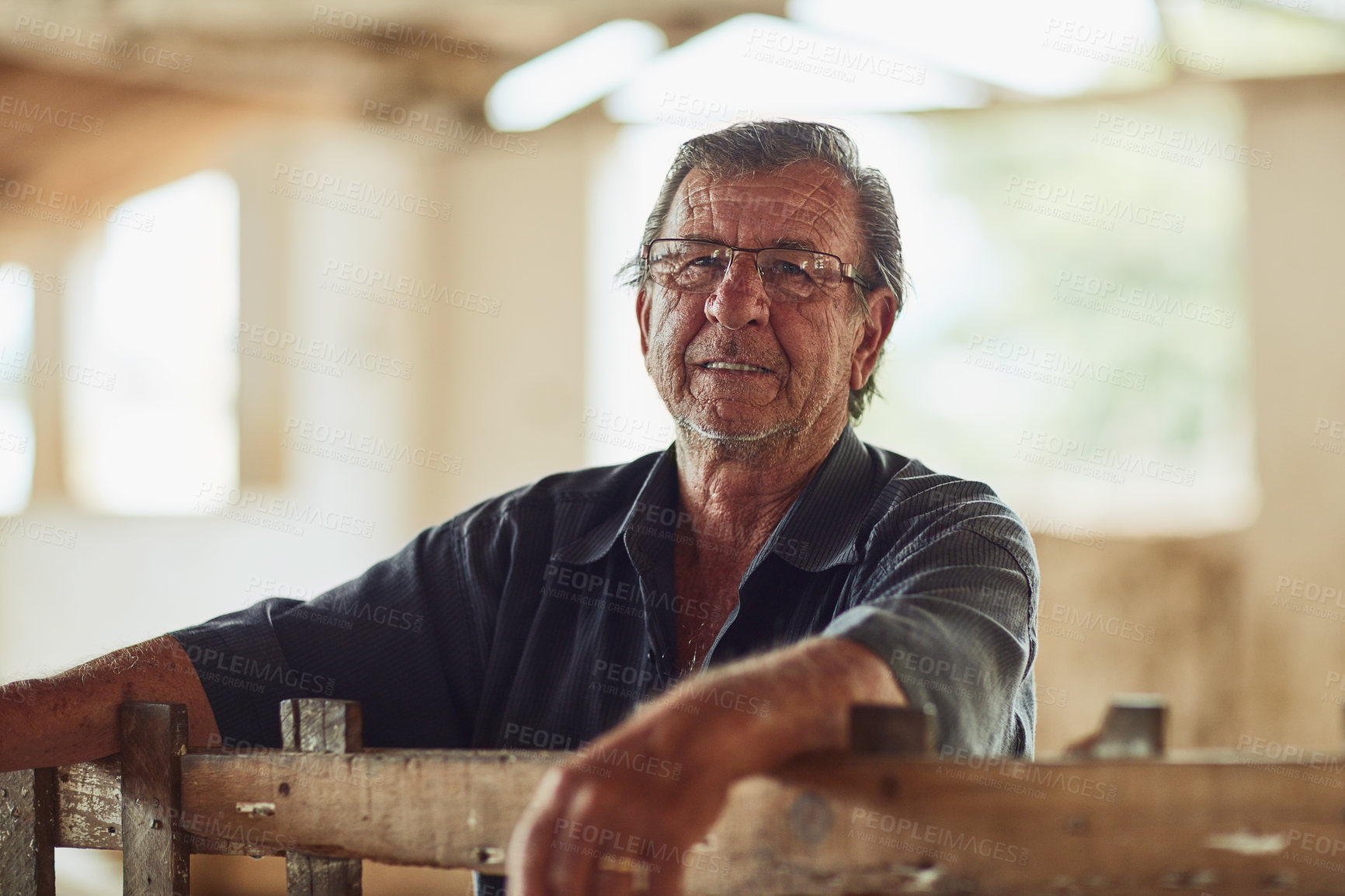 Buy stock photo Portrait of a male farmer inside a barn
