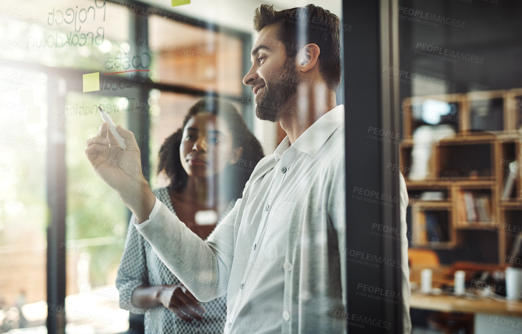 Buy stock photo Boardroom, glass and people in business, smile and planning in office, brainstorming and writing. Project, employees and calligraphy in company, creative and collaboration of teamwork and ideas