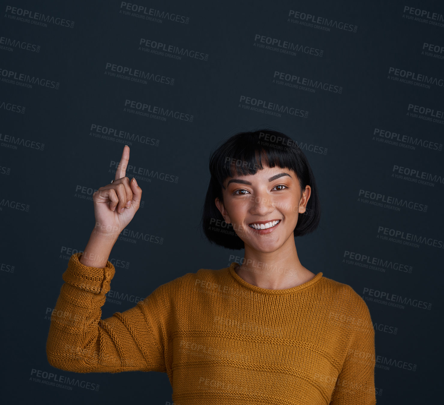 Buy stock photo Woman is pointing up, marketing and mockup space with portrait, smile and promo isolated on blue background. Young female person, happy ambassador and branding with advertising and show in studio