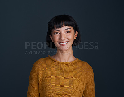Buy stock photo Woman with smile in portrait, happy and confident with young person isolated on blue background. Youth, gen z and female model in studio with mockup space, positive mindset and happiness
