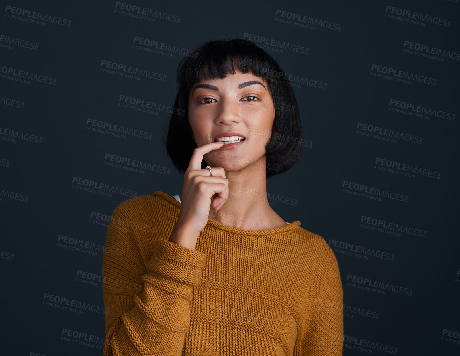 Buy stock photo Portrait, girl and biting finger in studio for flirting, sensual romance and playful with confidence. Woman, beauty and passion emotion for love, seductive gesture and desire on dark background