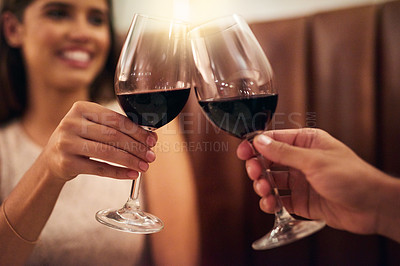 Buy stock photo Hand, wine glasses and couple in restaurant for achievement, celebration or romance on Valentines day. Romantic, man or happy woman with zoom, cheers or alcohol for date, affection or toast with love