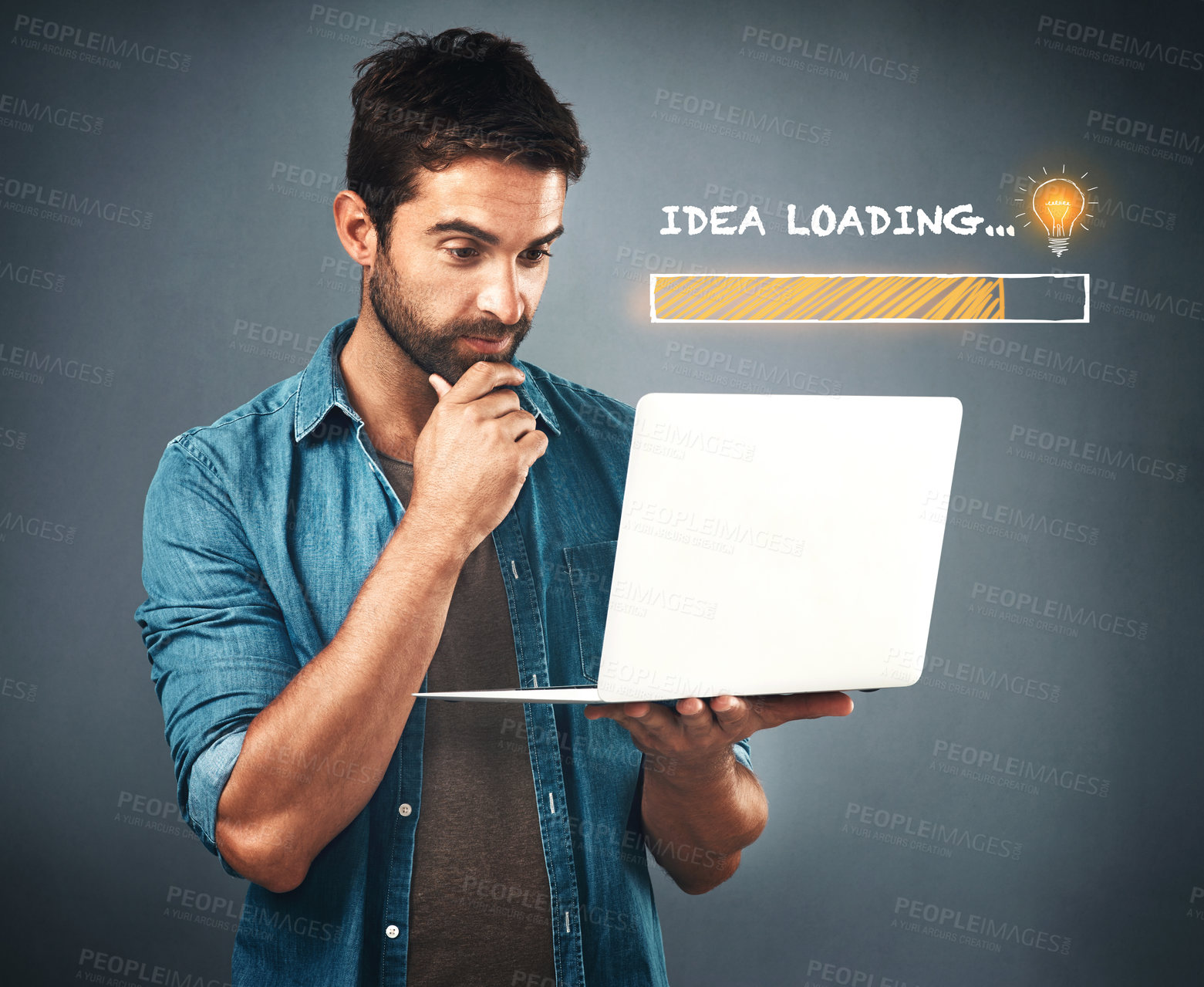 Buy stock photo Studio shot of a handsome young man looking thoughtful while working on his laptop beside an illustration of a loading bar against a grey background