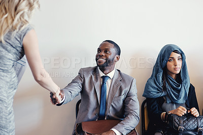 Buy stock photo Job interview, handshake or businessman with hr in waiting room for meeting, onboarding or career opportunity. Hiring, recruitment or girl shaking hands with group for contract offer or networking