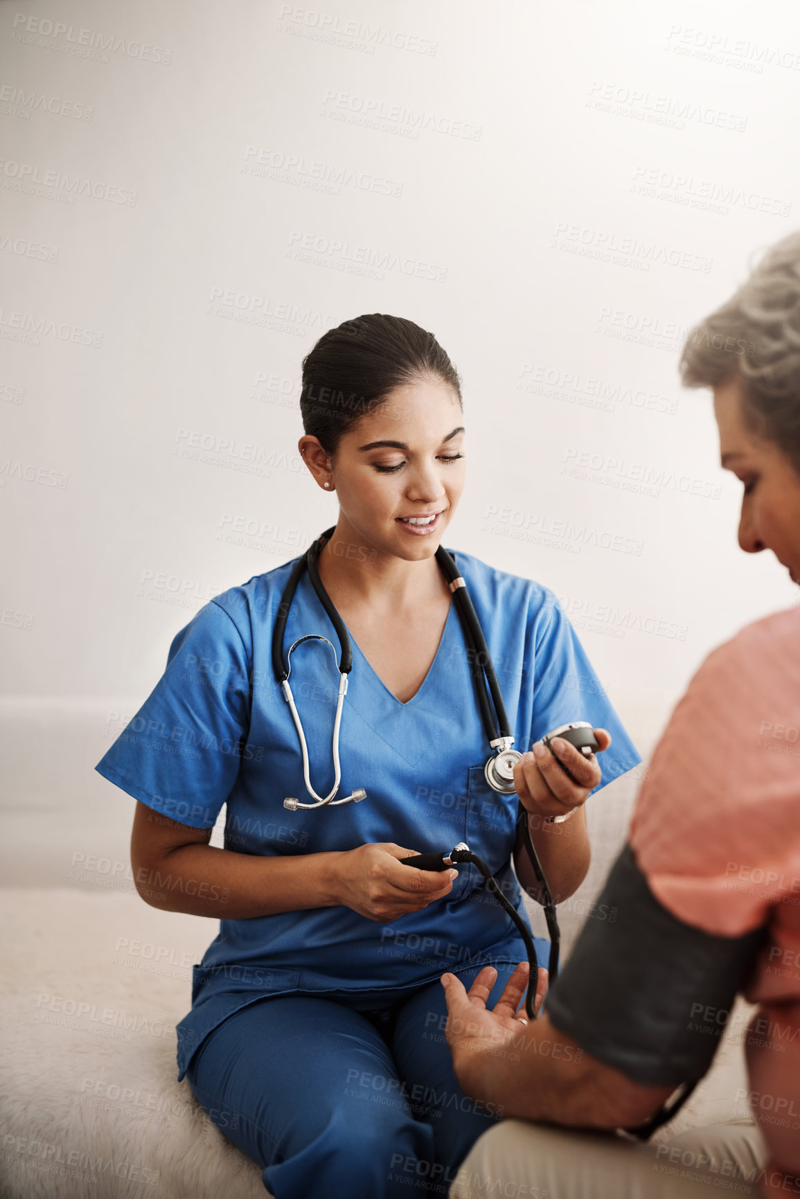 Buy stock photo Woman, blood pressure and doctor in hospital for service healthcare, heart rate or hypertension appointment for wellness. Medic, diabetes patient and medical exam to check pulse, results or advice
