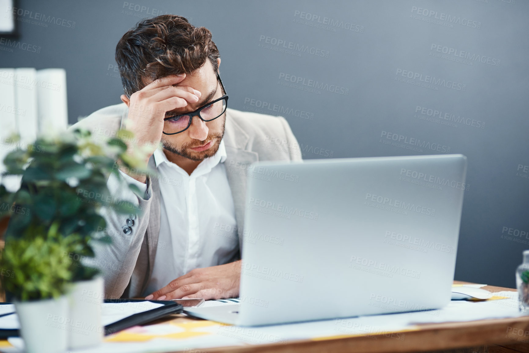 Buy stock photo Man, laptop and headache in office with stress, mistake or thinking of solution with fatigue at insurance agency. Person, computer and pain for business, decision or exhausted with burnout at company